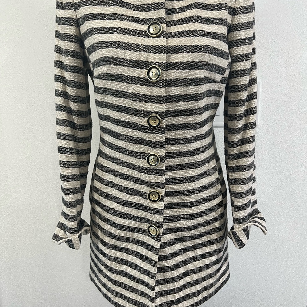 Unique jacket, size 4, 28” long. Great condition